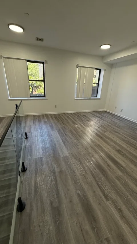 Empty room with freshly cleaned floors