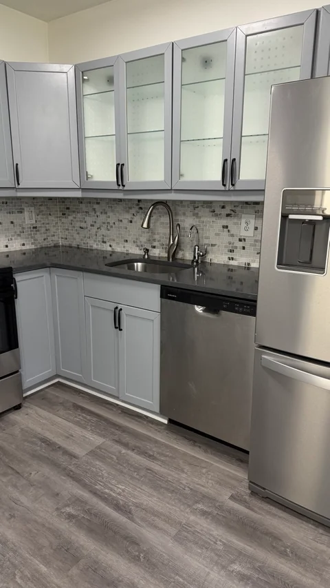Kitchen with clean counters and appliances